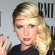 Illustration for article titled Kesha Emerges from Rehab and Drops the Dollar Sign from Her Name